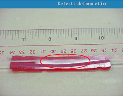 Deformation defect on pink plastic