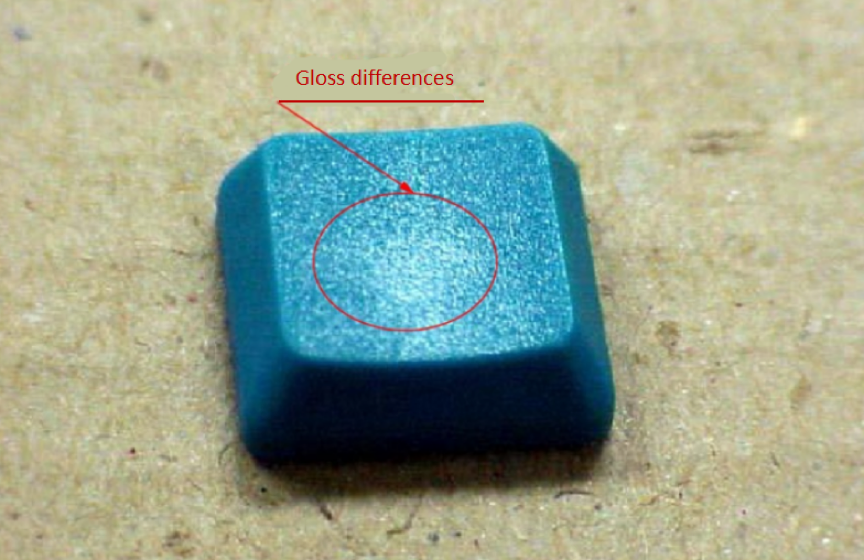 Gloss differences on blue plastic
